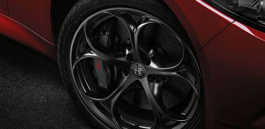 Close up of an Alfa Romeo's tyres and alloy wheels