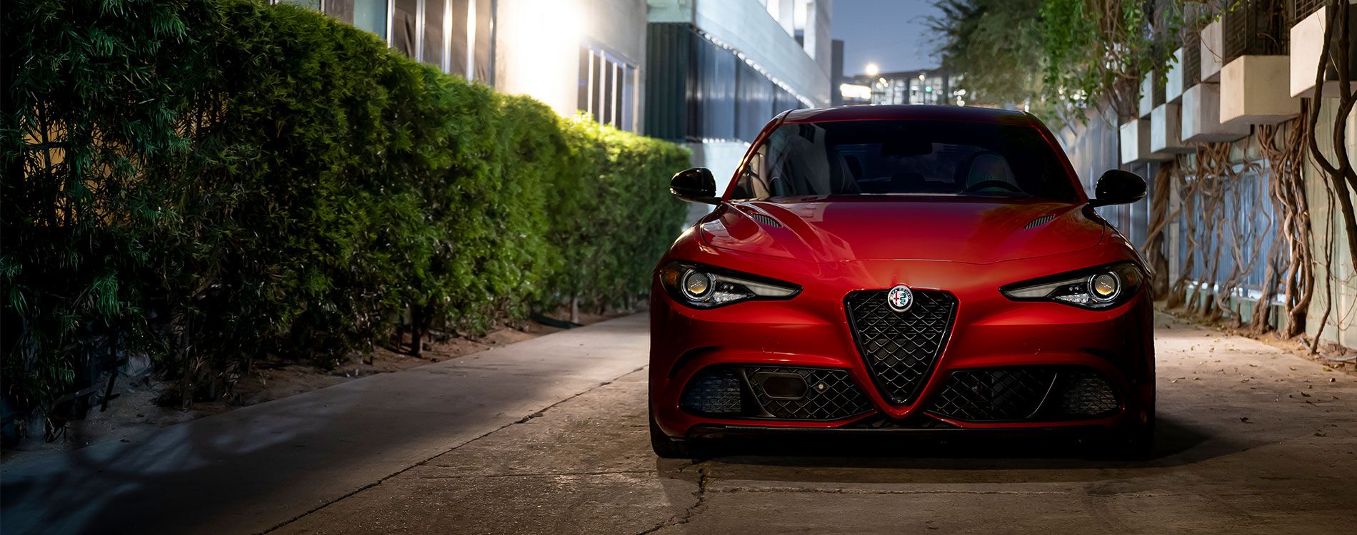 Front view shot of a red Alfa Romeo Giulia QV