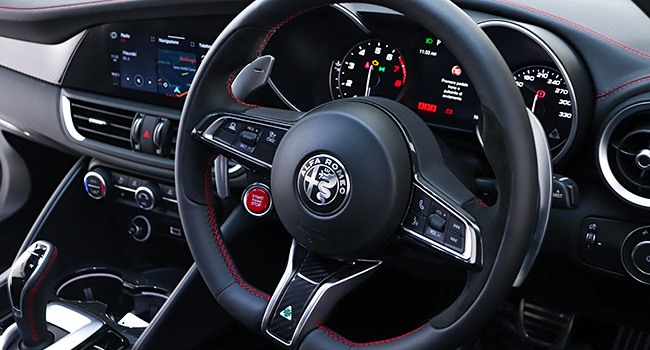 Right hand drive steering wheel in a Giulia QV