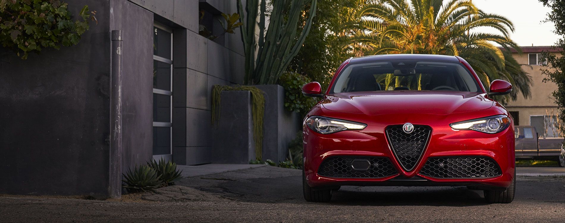 Front view shot of a red Alfa Romeo Giulia