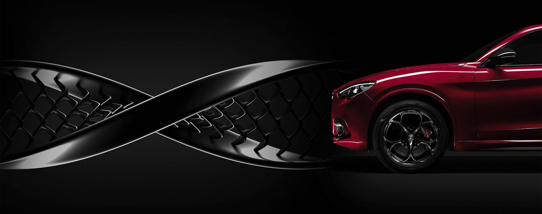 Rear 3/4 shot of a blue stelvio-qv parked on a road side