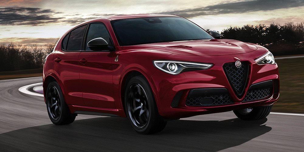 Red Stelvio QV driving on a track