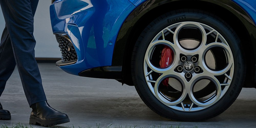 Front alloy wheel and braked caliper on a Tonale